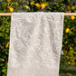 Harmony premium cotton bath towel in elegant beige, offering luxurious comfort and style.