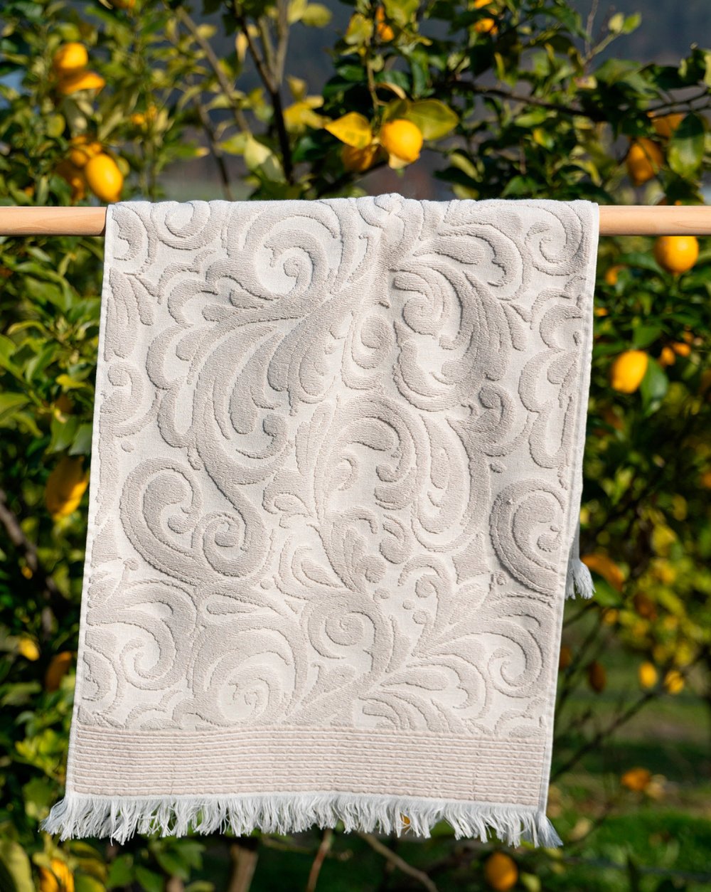 Harmony premium cotton bath towel in elegant beige, offering luxurious comfort and style.