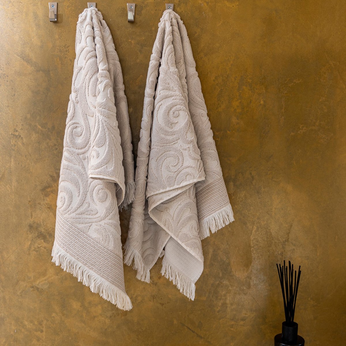 Harmony premium cotton bath towel in elegant beige, offering luxurious comfort and style.