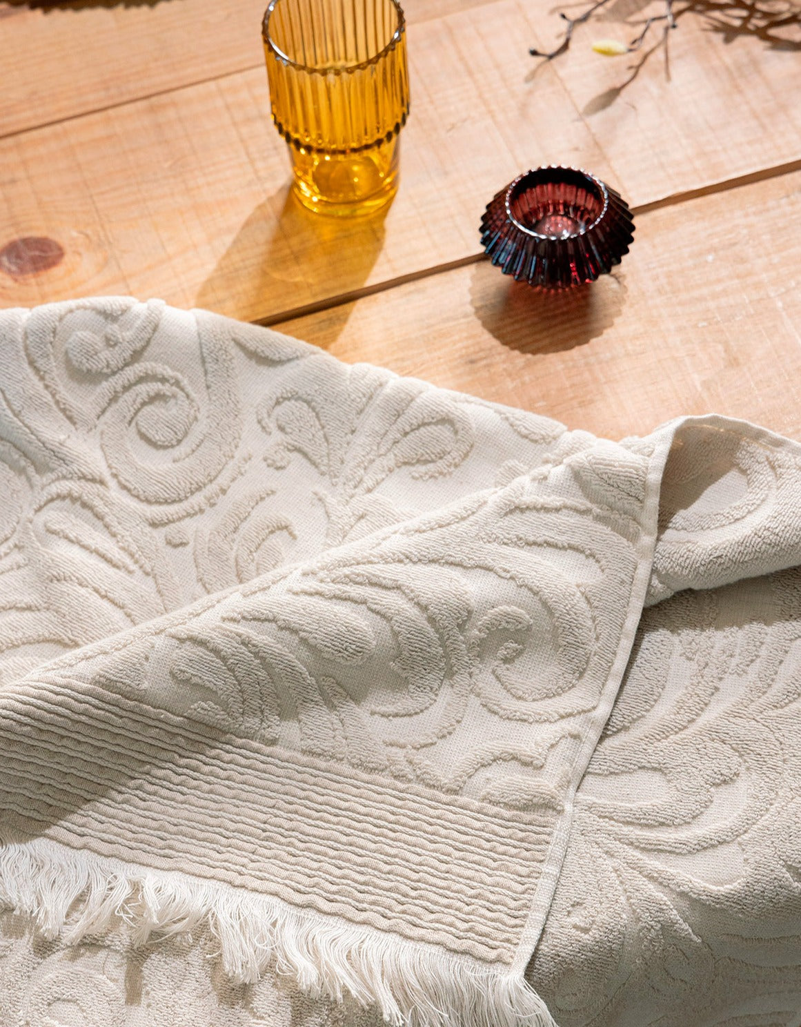 Harmony premium cotton bath towel in elegant beige, offering luxurious comfort and style.