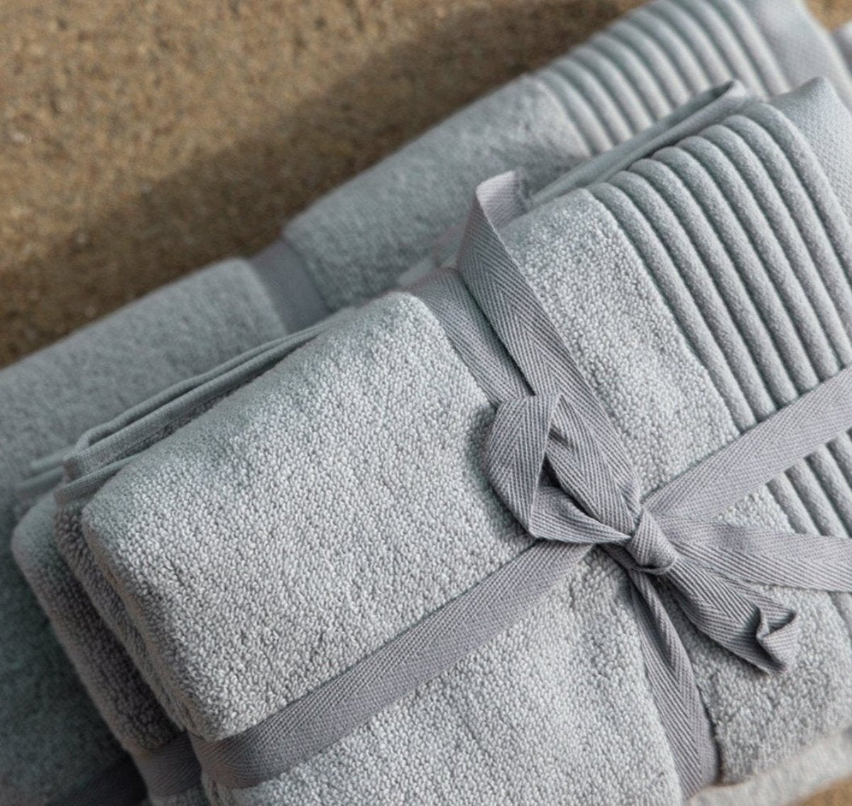 Silver Mist Fluffy Bath Towel - A luxurious and plush bath towel in a serene silver mist color. Designed for ultimate comfort and absorbency, perfect for indulging in post-shower relaxation. Crafted from premium materials to provide a soft and gentle feel against the skin.