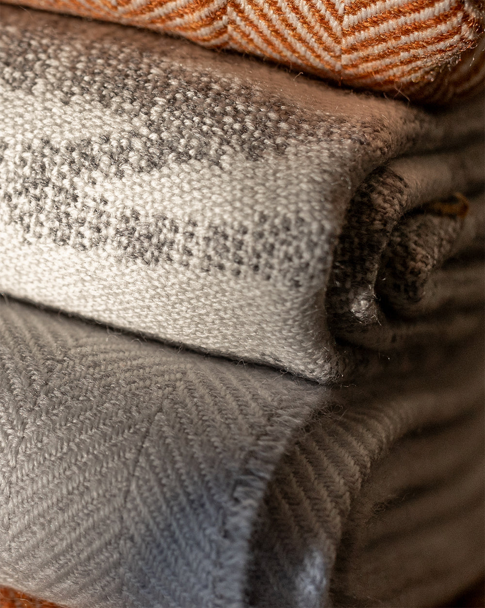 Photo showcasing premium Italian wool plaid, exuding elegance and warmth in its intricate design.