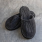 Sequoia organic cotton men's slippers in beige, displayed against a white background, highlighting their soft texture, slip-on design, and sturdy sole for comfort and durability.