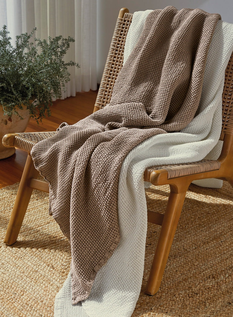 Wrap yourself in luxury with SOWL Home's Mocha Organic Cotton Throw Blanket. Made from premium organic cotton, this cozy throw offers warmth and style for your home.